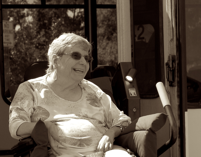 Image of a person with a disability smiling