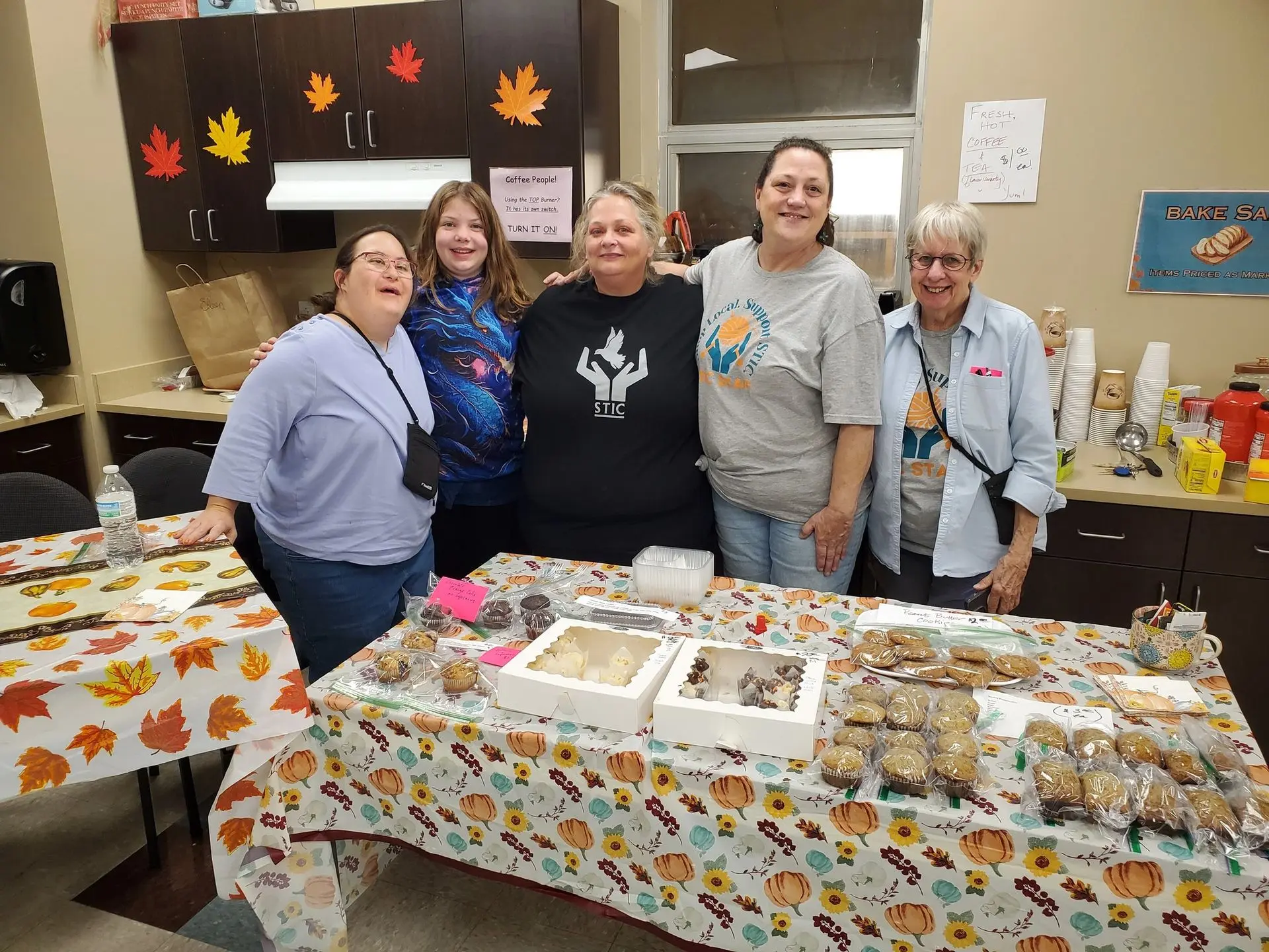 Image showing STIC staff and participants selling baked goods